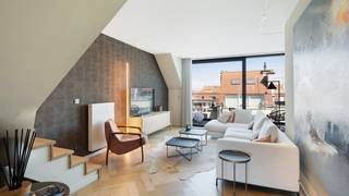 Exclusief te koop: Uitzonderlijk duplex penthouse van 125 m² in residentie William, een recent en stijlvol gebouw uit 2020, ideaal gelegen in...