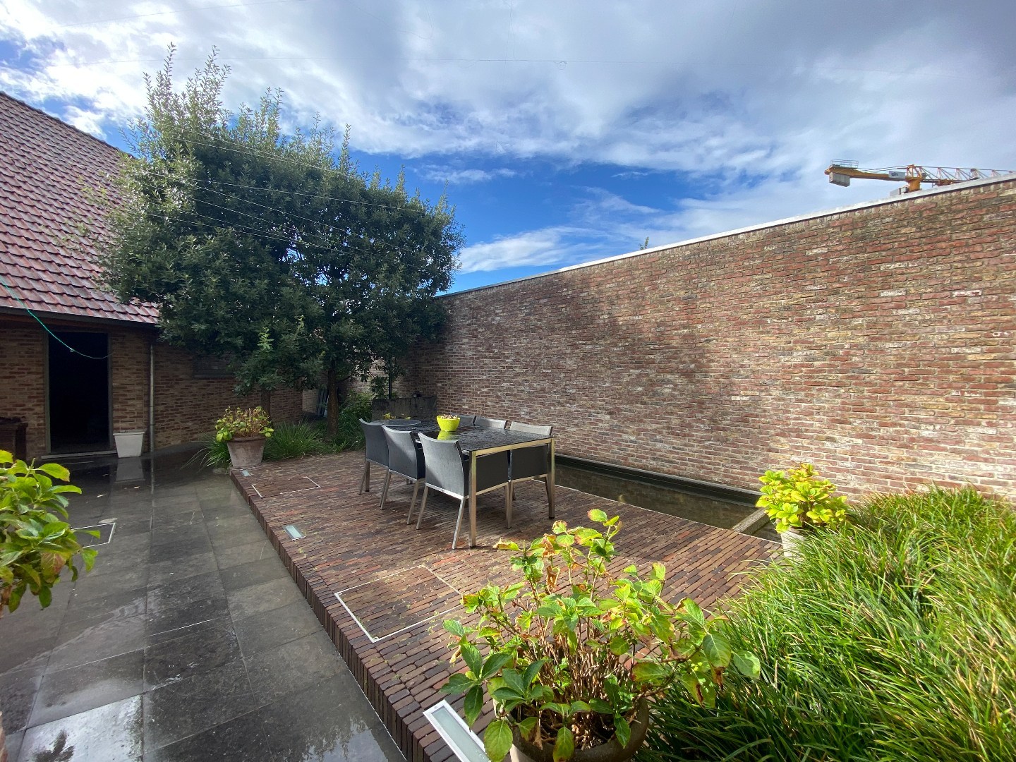 Multifunctioneel handelspand met luxueuze woonst op centrumligging in Sint-Eloois-Vijve! - foto 3