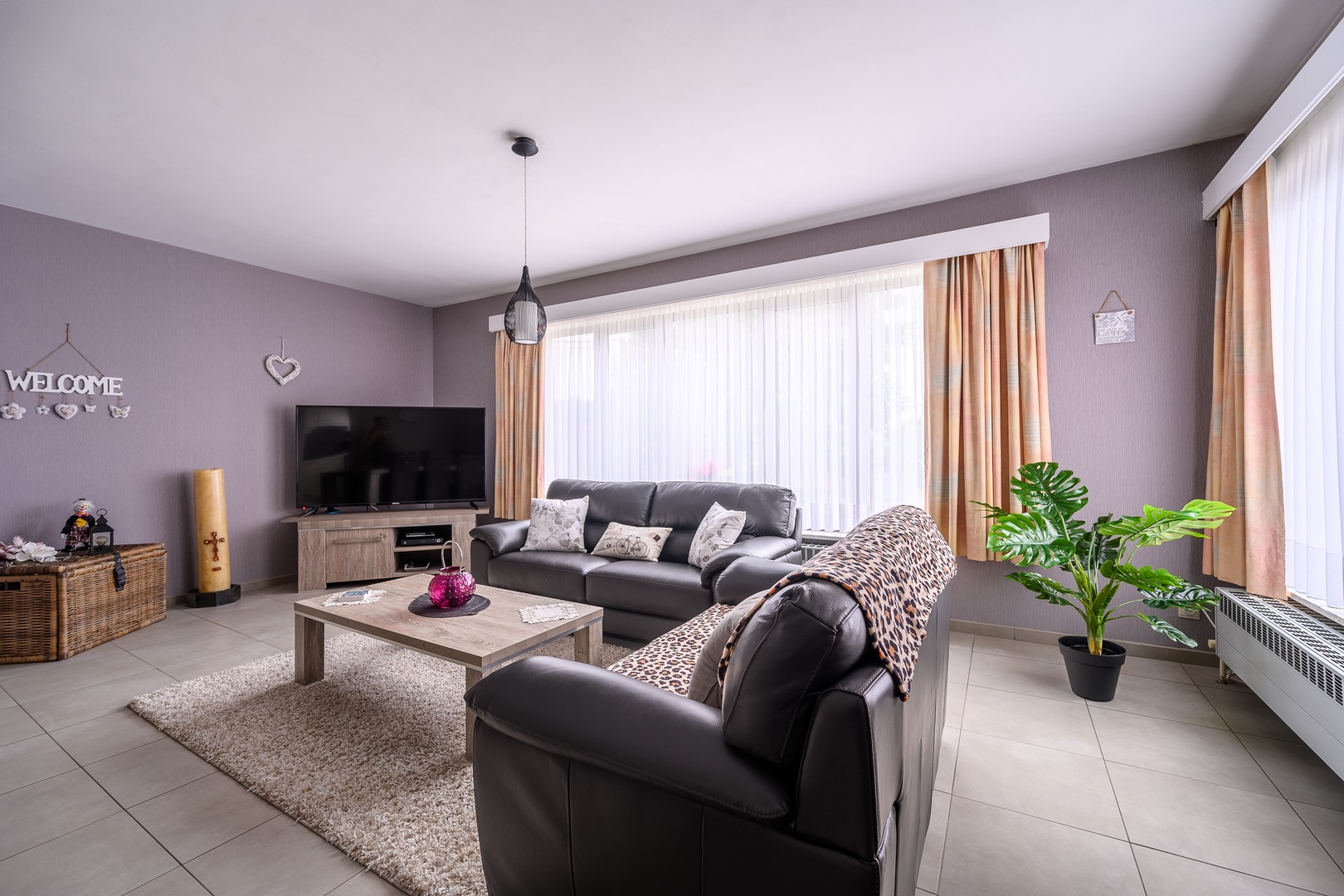 Appartement met 2 slaapkamers, terras en garagebox - foto 4