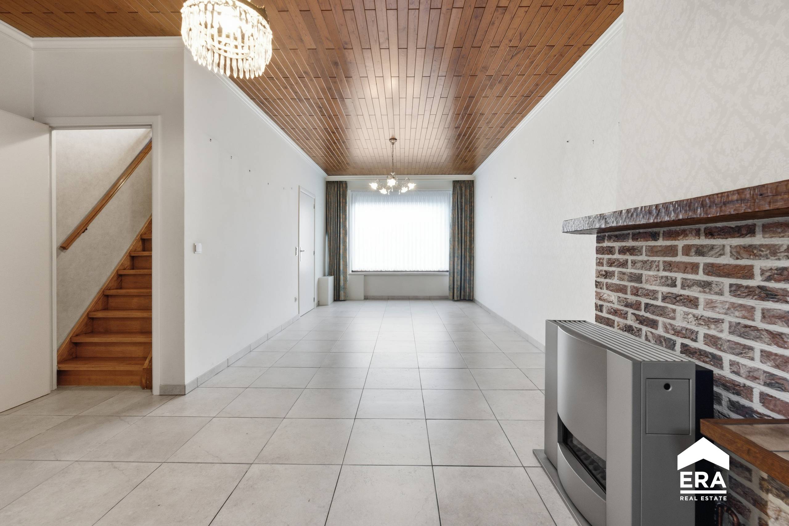 Statige rijwoning met tuin en externe garage in Roeselare - foto 4