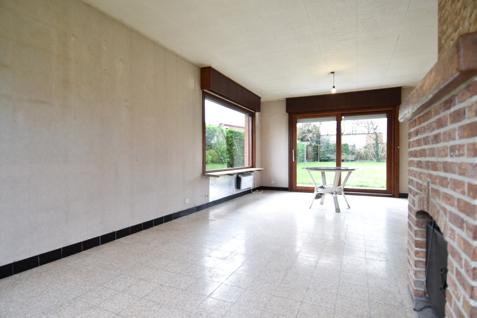 Ruime alleenstaande woning met 2 slaapkamers (mogelijkheid tot meer!), garage en zonnige tuin te koop in Gullegem - foto 5