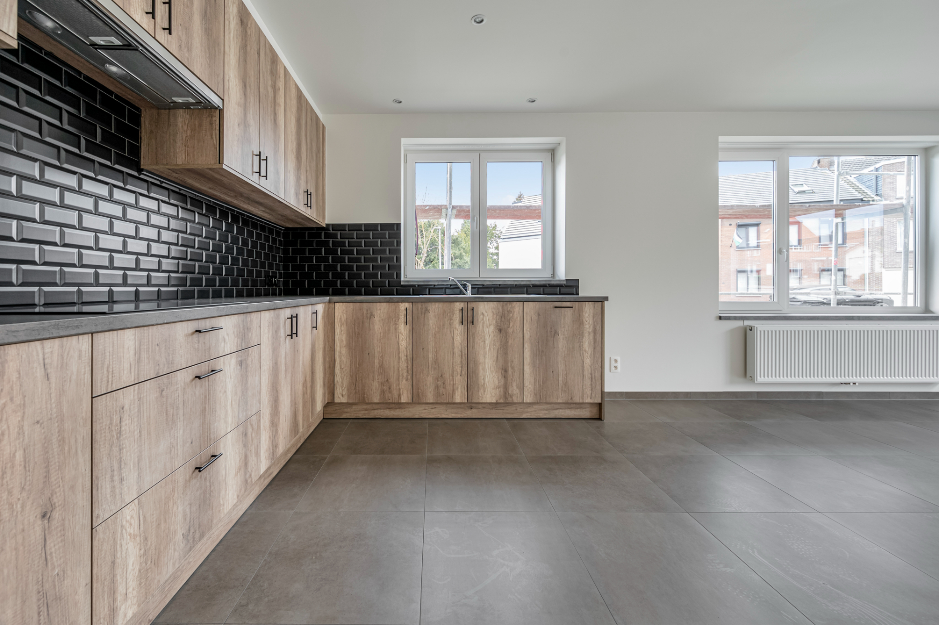 Ruim gelijkvloers appartement met 2 slaapkamers. - foto 3