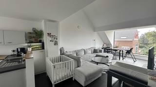 ### Lichtrijk appartement met hoge plafonds en zonneterrasDit instapklaar 2-slaapkamer appartement van 96m² combineert een moderne afwerking met een...
