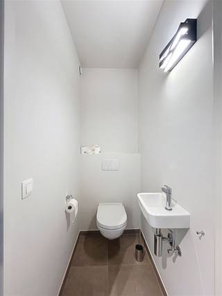 Recent en energiezuinig appartement met moderne afwerking Dit appartement is gelegen op de eerste verdieping van een recent gebouwd gebouw, uitgerust...