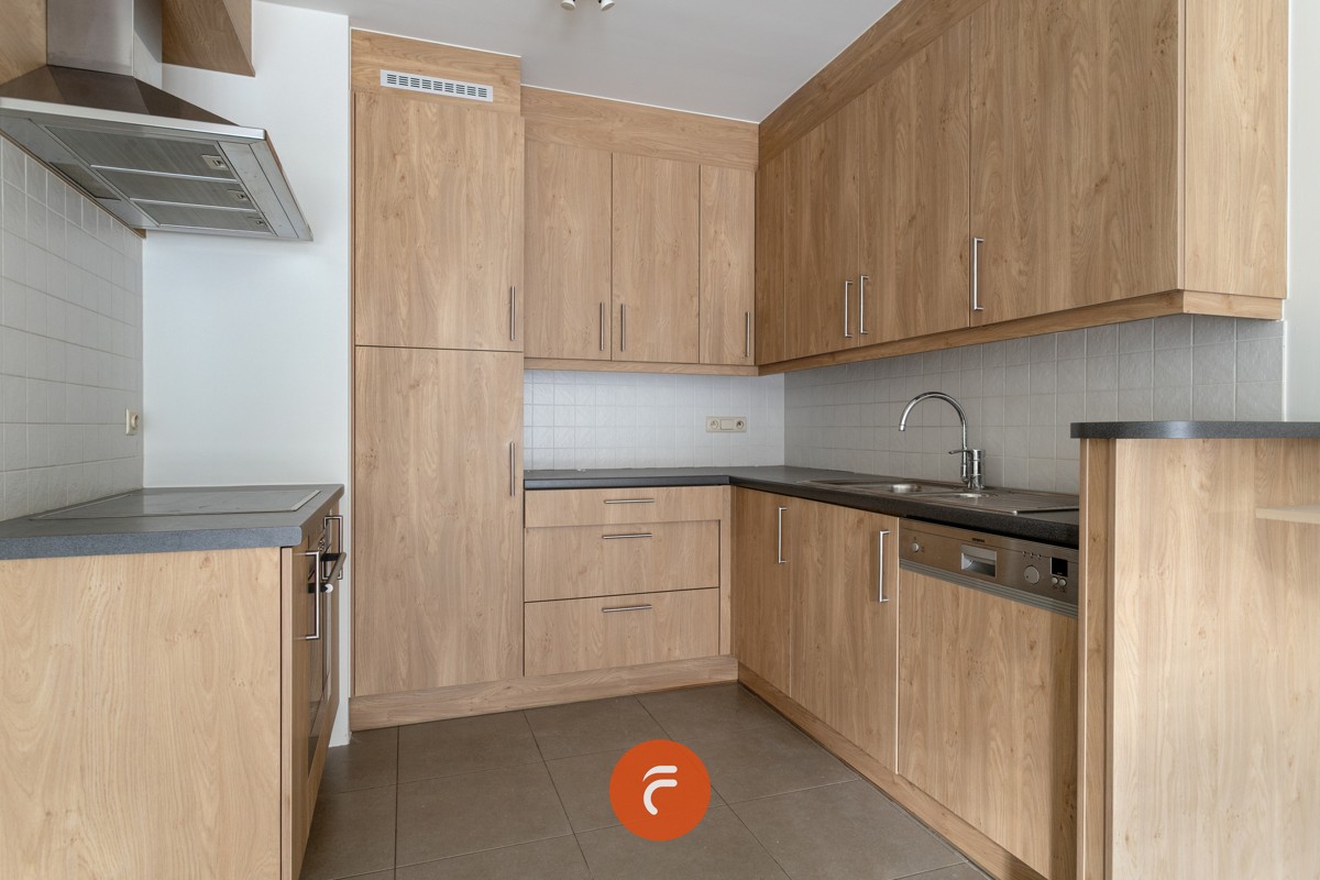Gelijkvloers appartement met 2 slaapkamers, terrasje en garage - foto 5