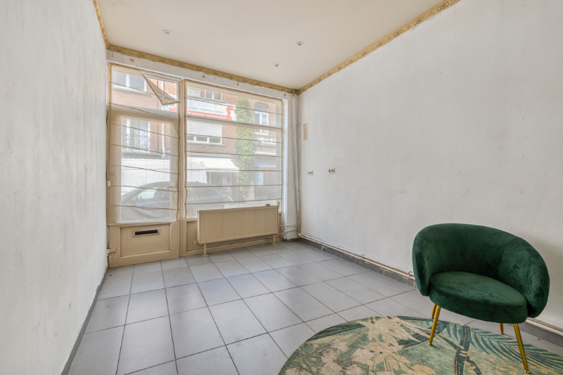 Tussenwoning met mogelijkheid tot handelsruimte in het centrum van Roeselare - foto 4