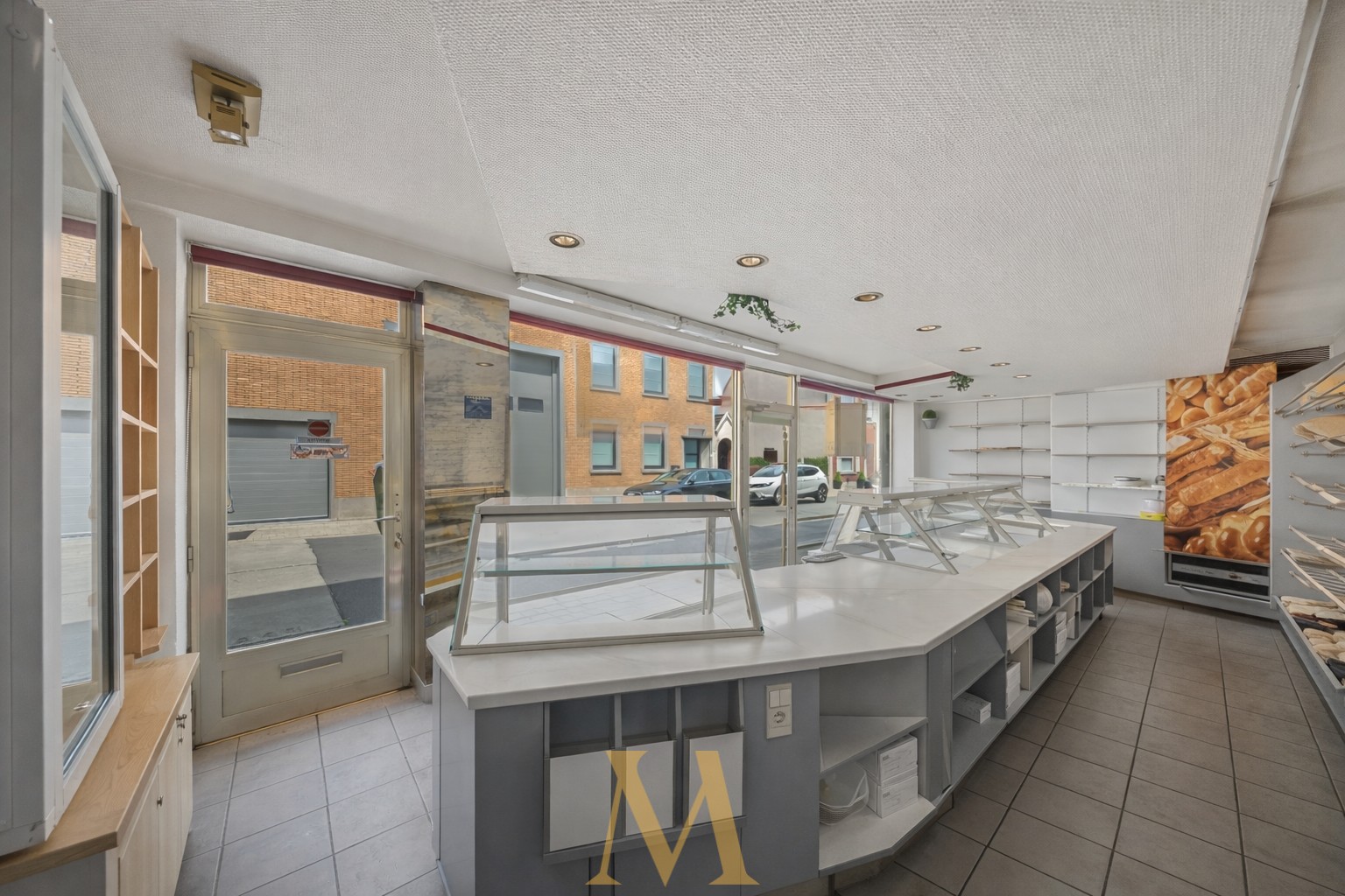 Ruim handelspand met woonst op toplocatie in Desselgem, eindeloze mogelijkheden! - photo 2