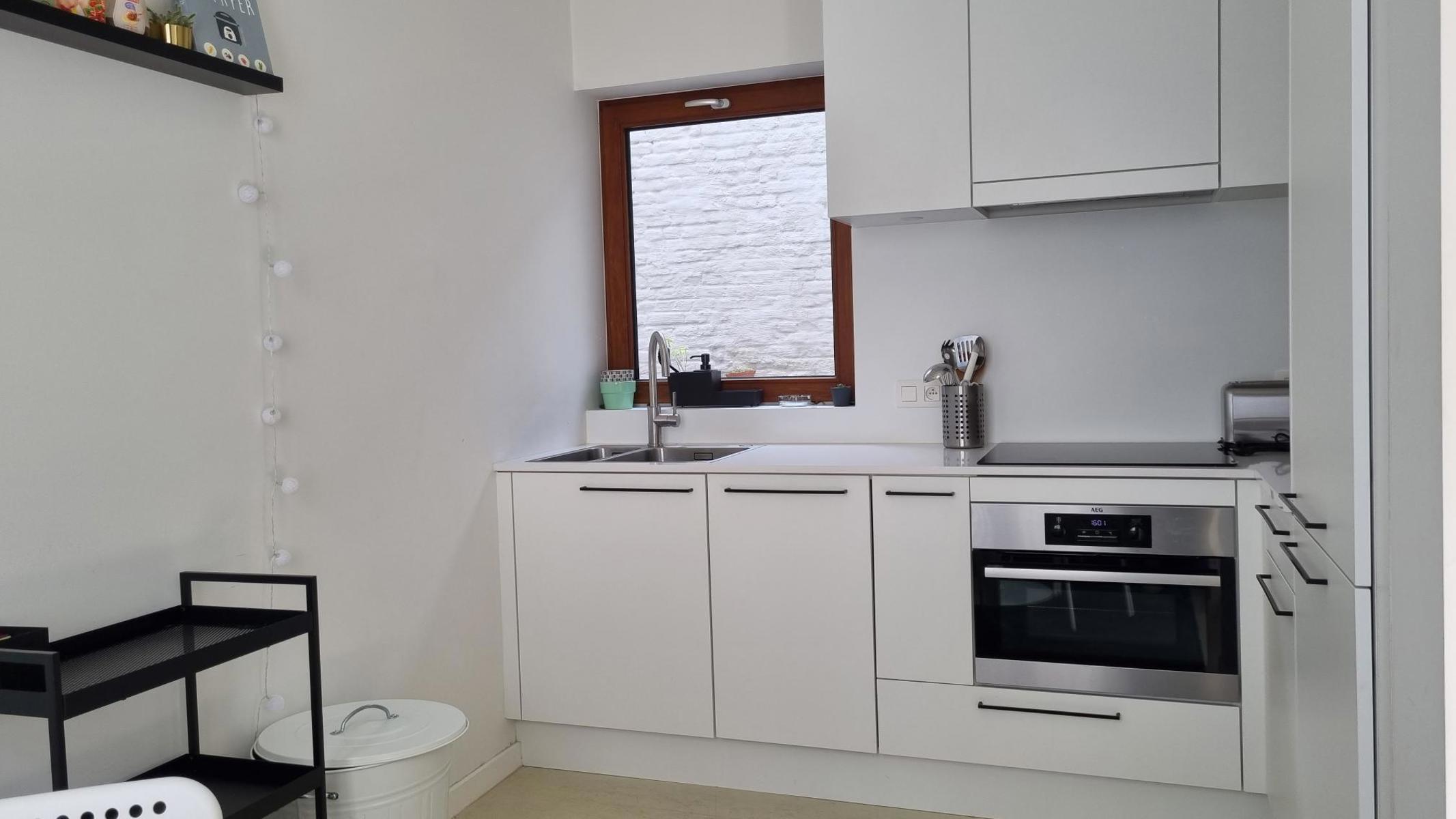 Charmante citéwoning met 3 slaapkamers en koer - foto 4