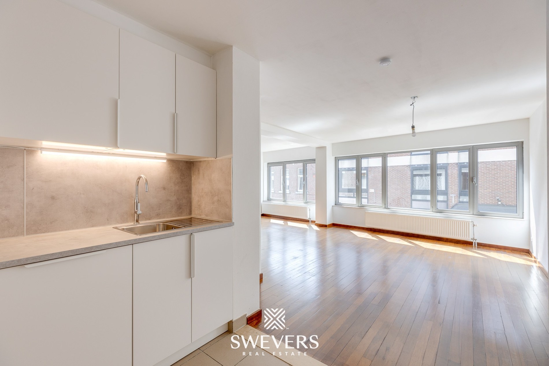 Ruim duplex-appartement in hartje Hasselt: ideaal voor 3 studenten of om te co-housen - foto 5