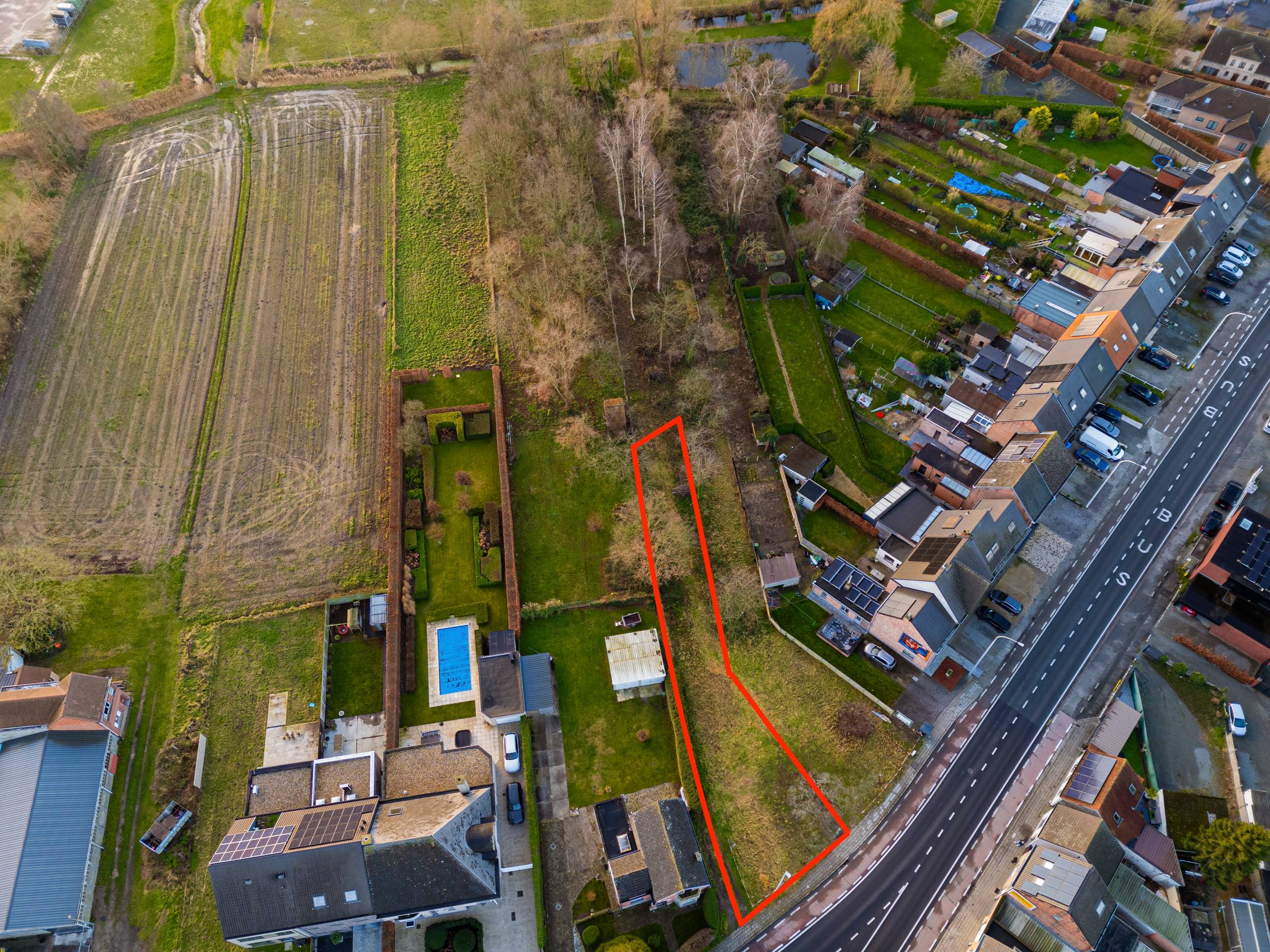 Mooie bouwgrond voor halfopen bebouwing in Appels - foto 1