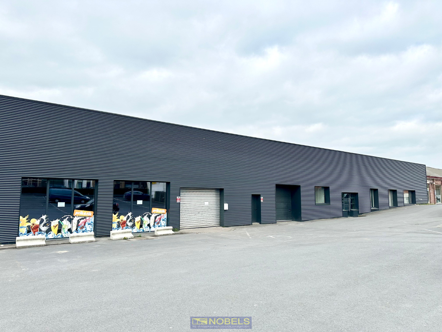 Te huur ruim, industrieel magazijn gelegen te Ronse - foto 1