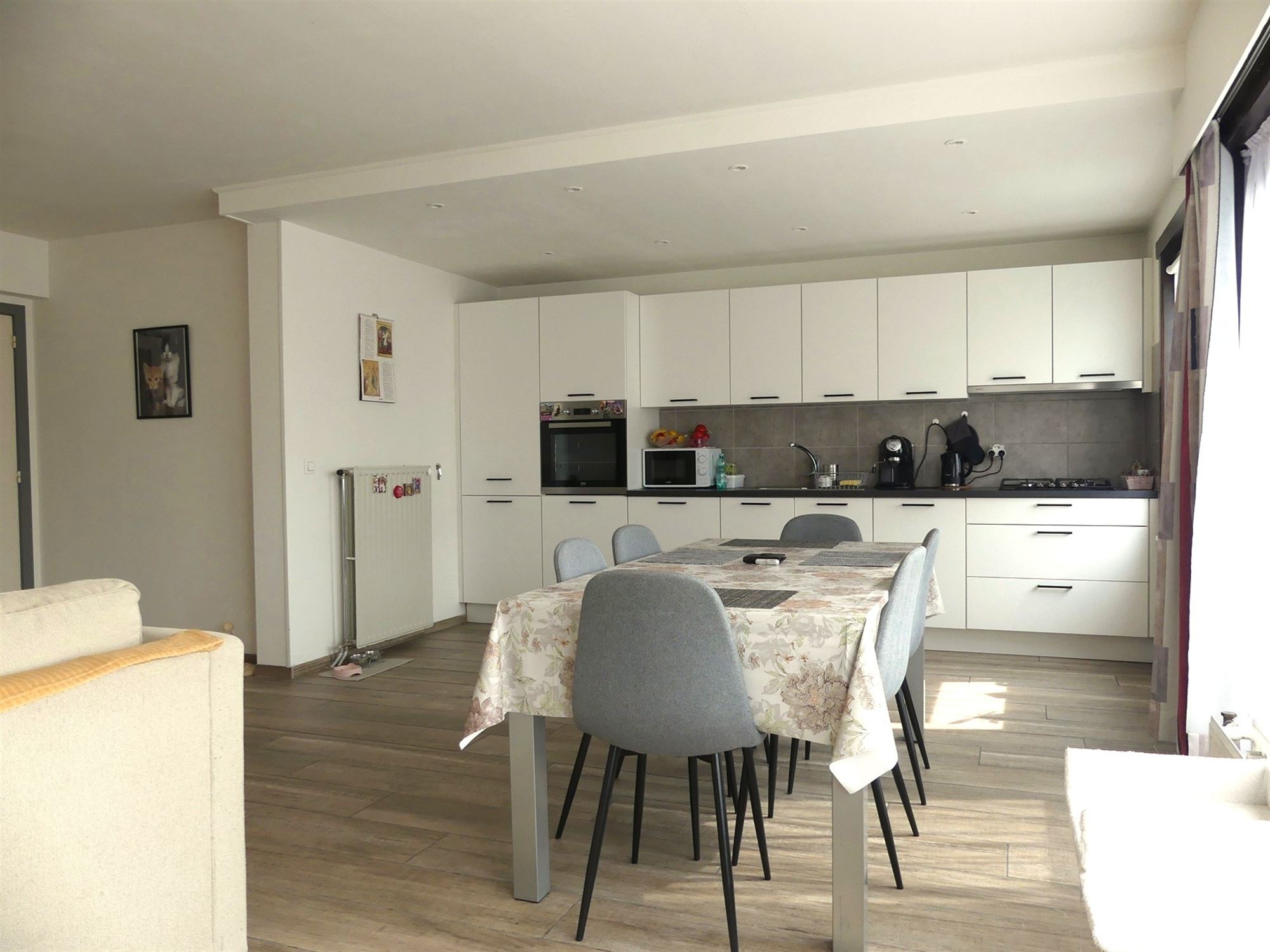 Gezellig appartement met 2 ruime slaapkamer, balkon en ondergrondse parkeerplaats - foto 4