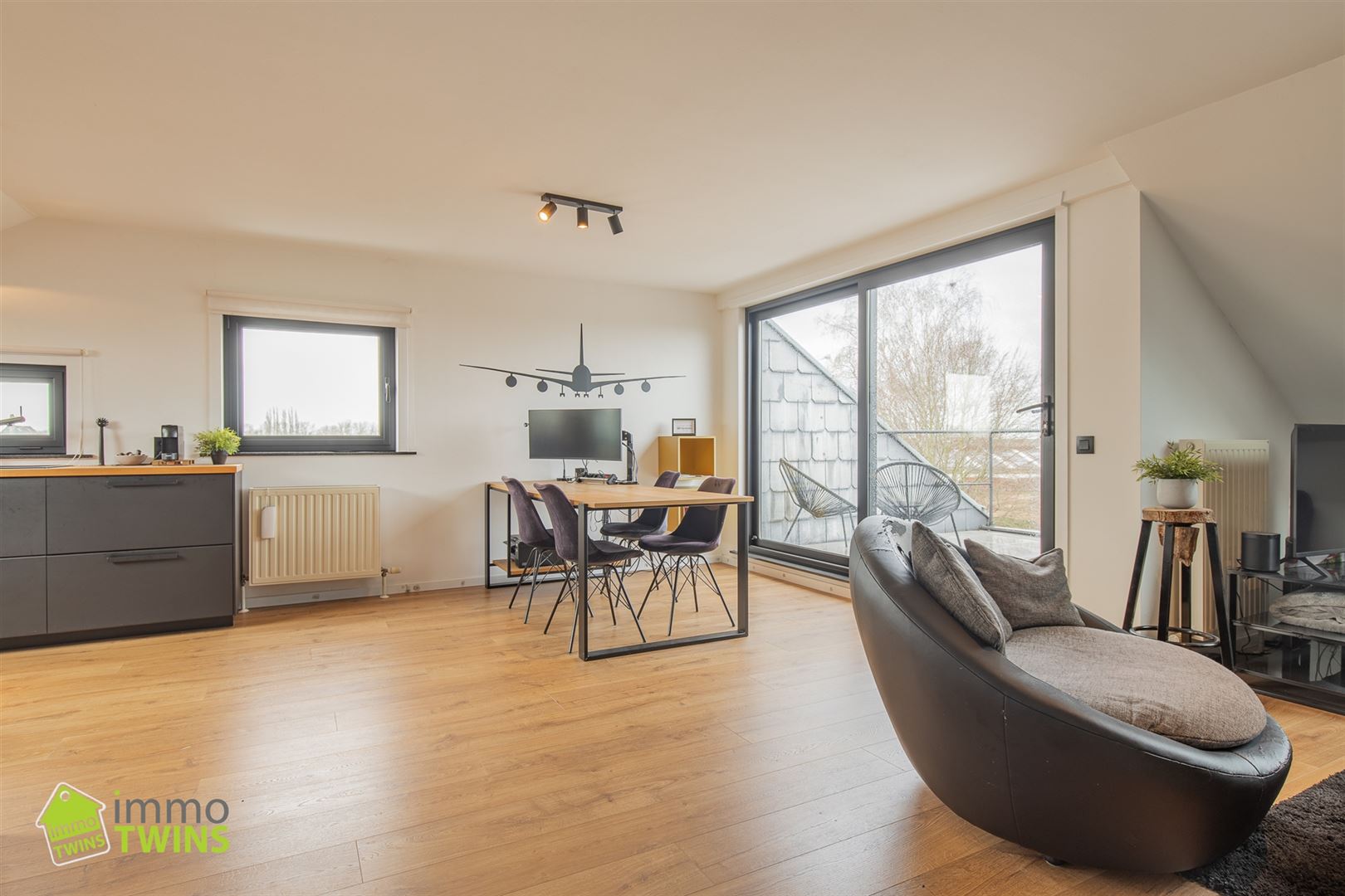 Lichtrijk en energiezuinig dakappartement met terras - foto 4