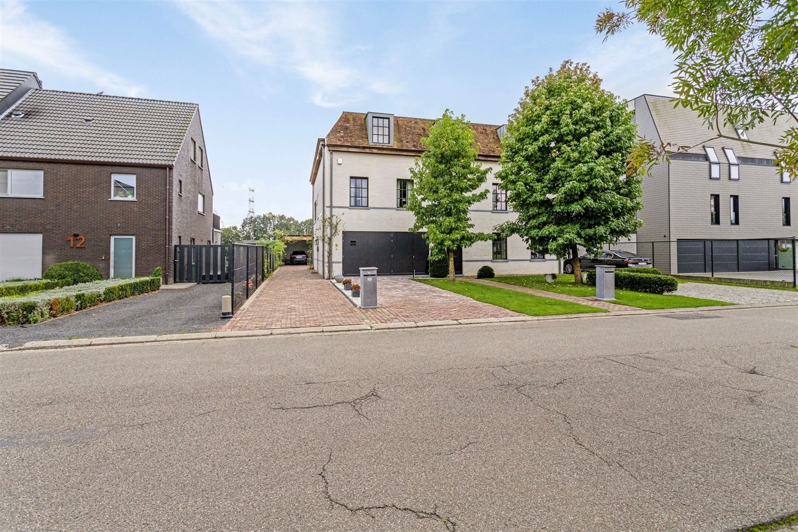 Uitzonderlijke Duplex met zicht op kanaal, garage, carport en ruime (wijn)kelder! - foto 4