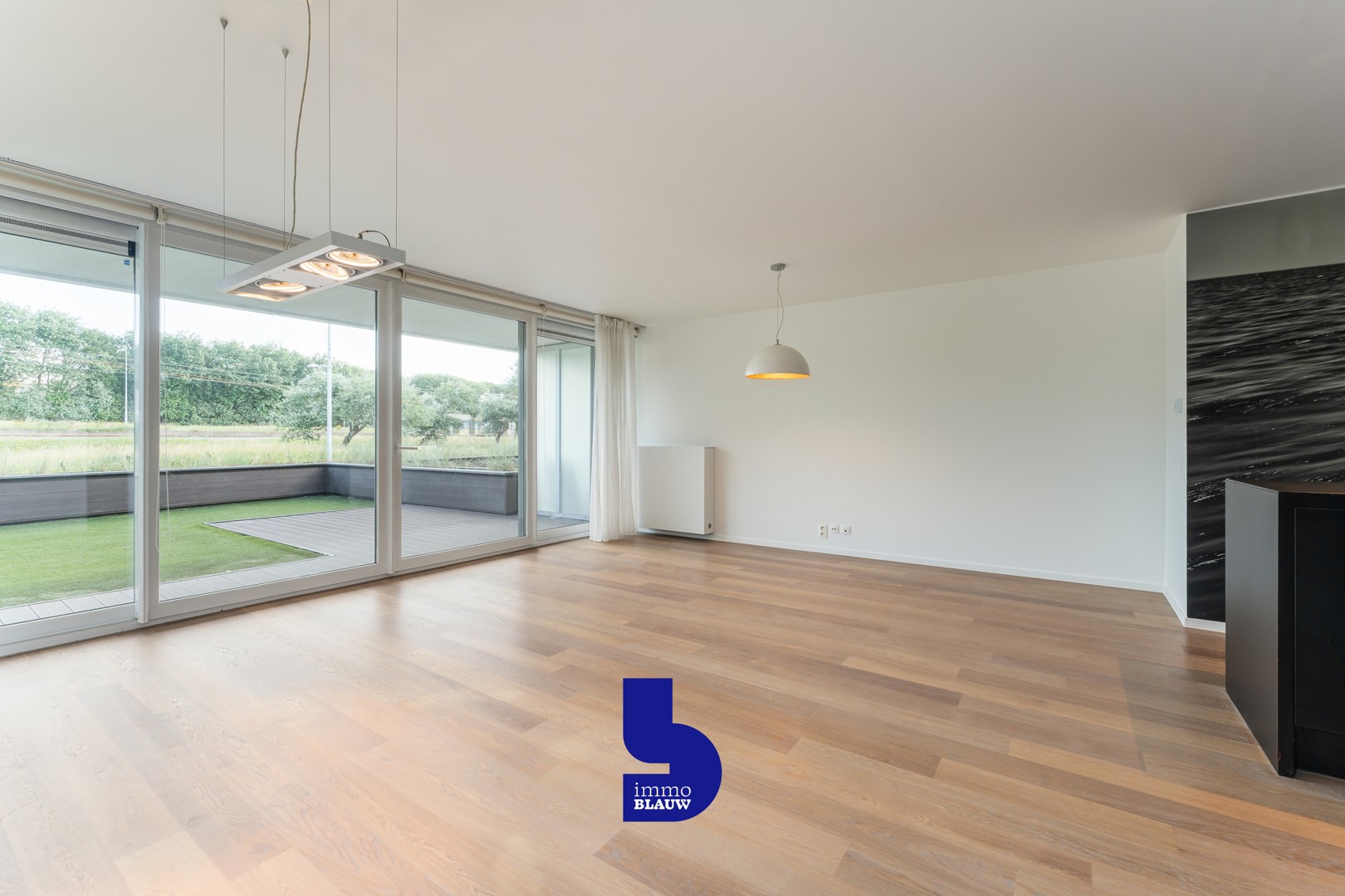 Luxueus gelijkvloers appartement met grote leefterrassen. - photo 5
