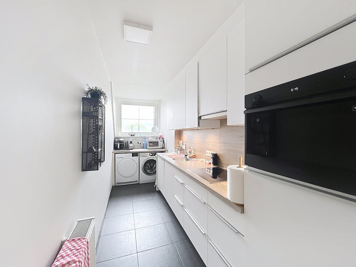 Lichtrijk appartement met 2 slaapkamers en garagebox te huur in Brugge - foto 5