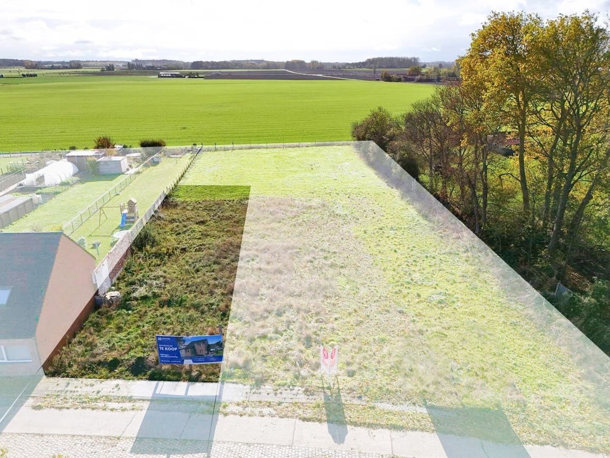 Mooi en zuidgericht stuk bouwgrond (558m²) voor halfopen bebouwing - foto 1