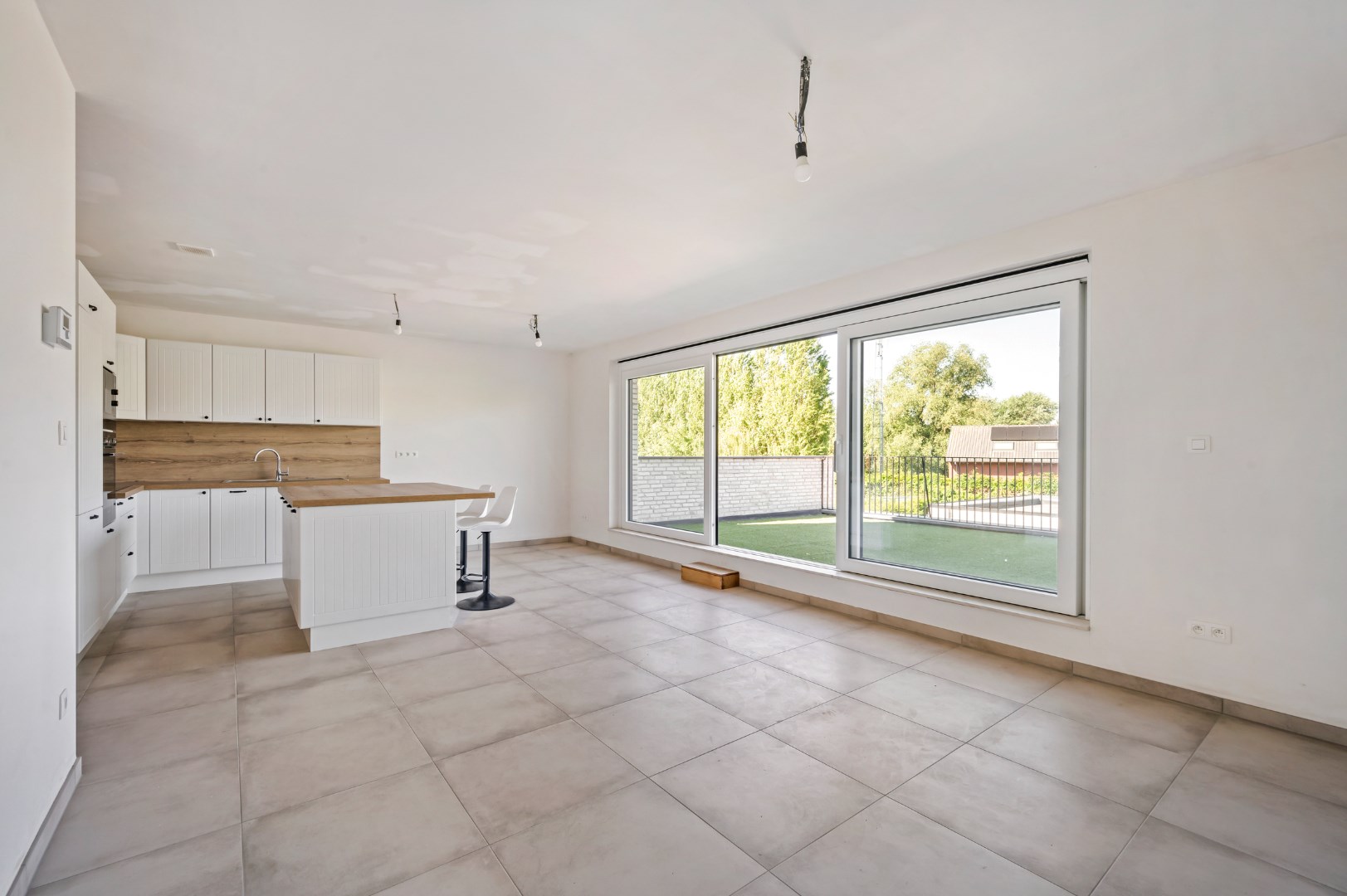 NIEUWBOUWAPPARTEMENT MET EPC A, 3 SLPKS EN 2 ZONGERICHTE TERRASSEN - foto 3