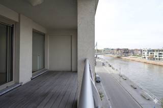 LAYOUT:<br />- entrance hall with guest toilet <br />- spacious and bright living space <br />- open kitchen (ceramic hob, extractor, oven, dishwasher & double sink) <br />- pleasant terrace with a view of the Leie <br />- spacious bedroom <br />- bathroom with shower, sink, toilet and towel dryer <br />- storage room with washing machine connection<br /><br />Overall: <br />- immediately available <br />- advance payment of common costs: €50.00/month<br />- including parking<br /><br />Would you like to view this apartment? Then quickly request your visit via www.dewaele.com