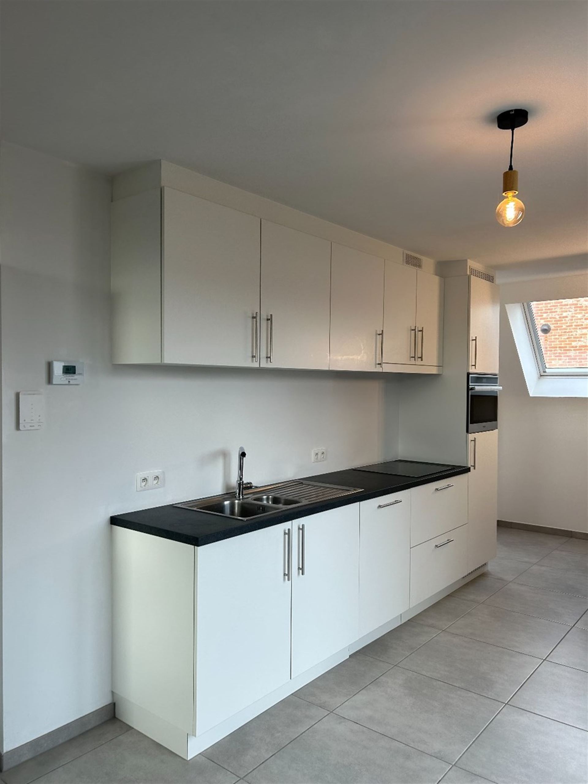Instapklaar duplexappartement met 1 slpk en autostaanplaats! - foto 4