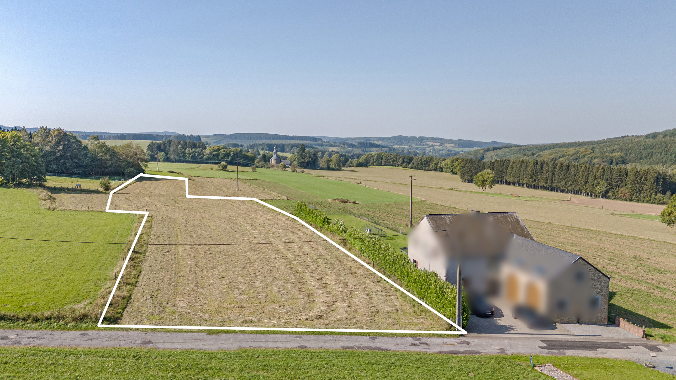 Bouwgrond open bebouwing op perceel van 5.751m² te Manhay. - foto 4