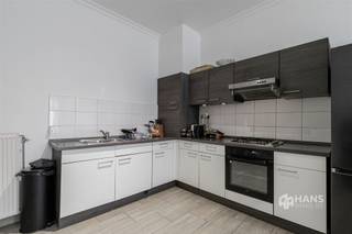 <p><span>Lange Lobroekstraat 169 - Antwerp (2060)</span></p><p><span> </span></p><p><span>First floor, front unit</span></p><p><span>Energy-efficient 1-bedroom apartment (59 m²) in Antwerp (2060).</span></p><p><span>On Lange Lobroekstraat, you’ll live in an up-and-coming neighborhood near Park Spoor Noord and the Slachthuissite. Shops, supermarkets, and other amenities are easily accessible, and there’s no shortage of public transportation options. Plus, you can reach the city center in no time by bike. Thanks to its proximity to major thoroughfares, access by car is also excellent.</span></p><p><span>The apartment is located at the front of the first floor of a small-scale building and has a living area of approximately 59 m². The building was completely renovated in 2008; the apartment has a favorable EPC rating of B and is equipped with up-to-code electrical wiring. There are separate utility meters, and the fixed costs remain exceptionally low at just 25 €s per month.</span></p><p><span>You enter through the hallway, which provides access to a separate toilet and a practical storage closet. To your left, you enter the open living area with an open kitchen, which together total approximately 27 m². Thanks to the large windows at the front, the space enjoys plenty of natural light. </span></p><p><span>The apartment also features a full-sized bedroom measuring 13 m². The bathroom, approximately 3 m², is equipped with a bathtub/shower and a vanity unit.</span></p><p><span>A practically laid-out and energy-efficient apartment with low fixed costs in a central location in Antwerp. Ideal as a first home or as an investment!</span></p><p><span>Living area: 59 m² (ref.: gross floor area, EPC). For more information or a free appraisal, visit </span><span><span>www.hansimmo.be</span></span></p><p><span> </span></p>