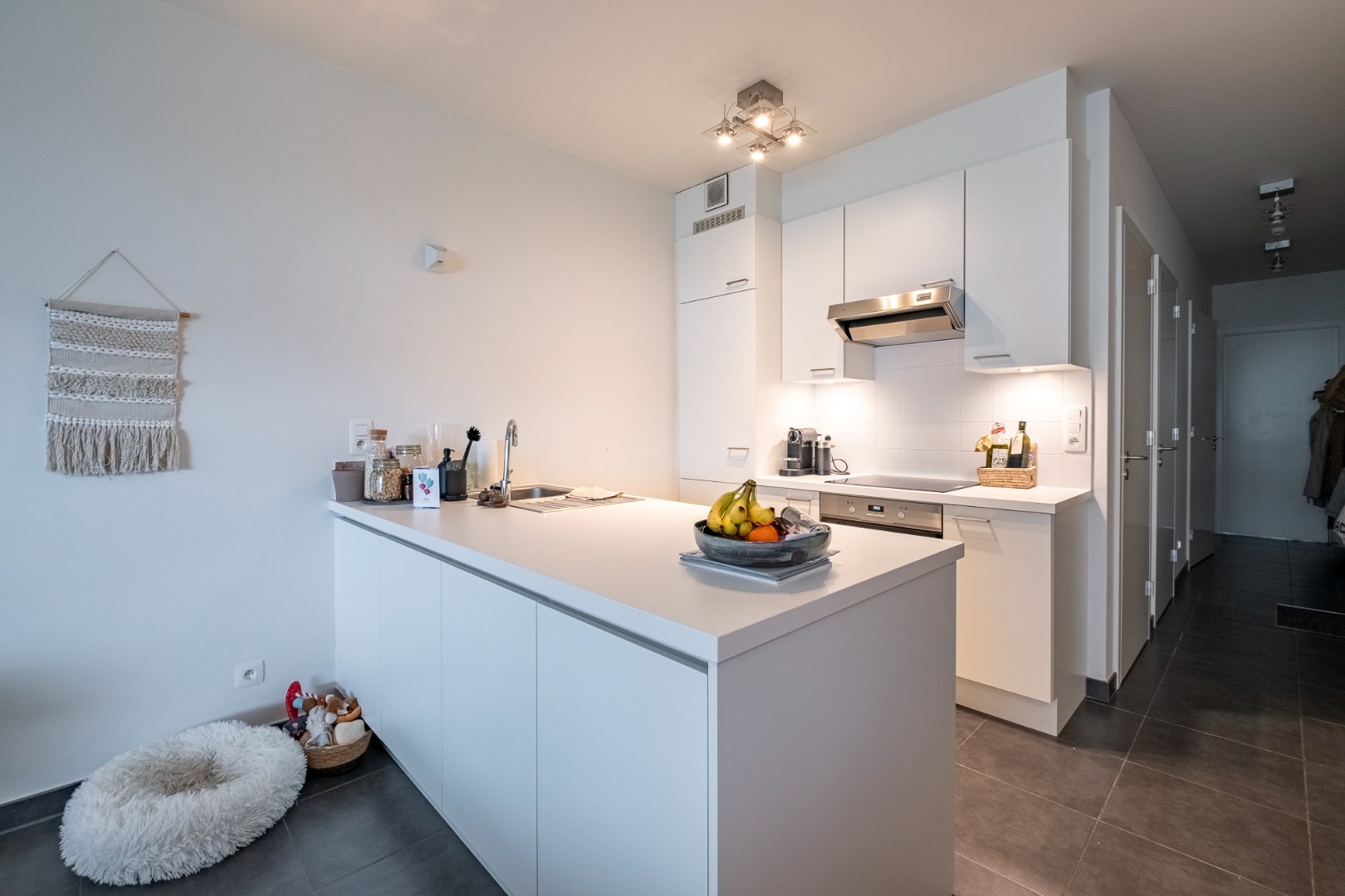 Lichtrijk gelijkvloers appartement met 2 slaapkamers en een gezellig tuintje - foto 5
