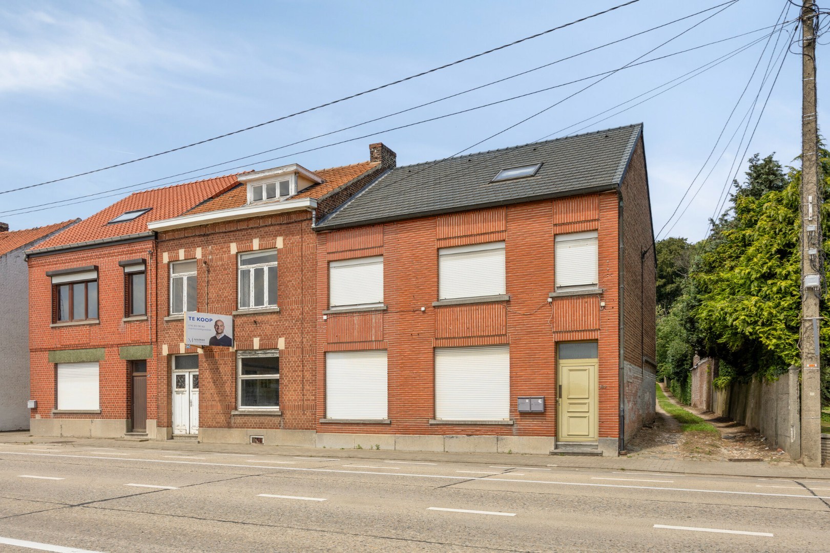 Ruime te renoveren woning met 3 slaapkamers in Lubbeek met doorgang langs het perceel van de buren. EPC: 736 KWH/m² - foto 2