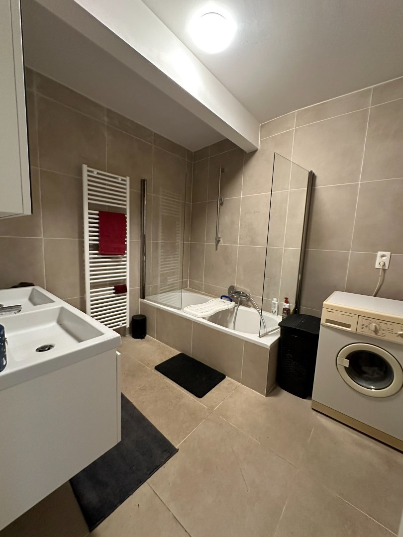 Zeer ruim en energiezuinig appartement met 2 slaapkamers en tuin in centrum Schoten - foto 3