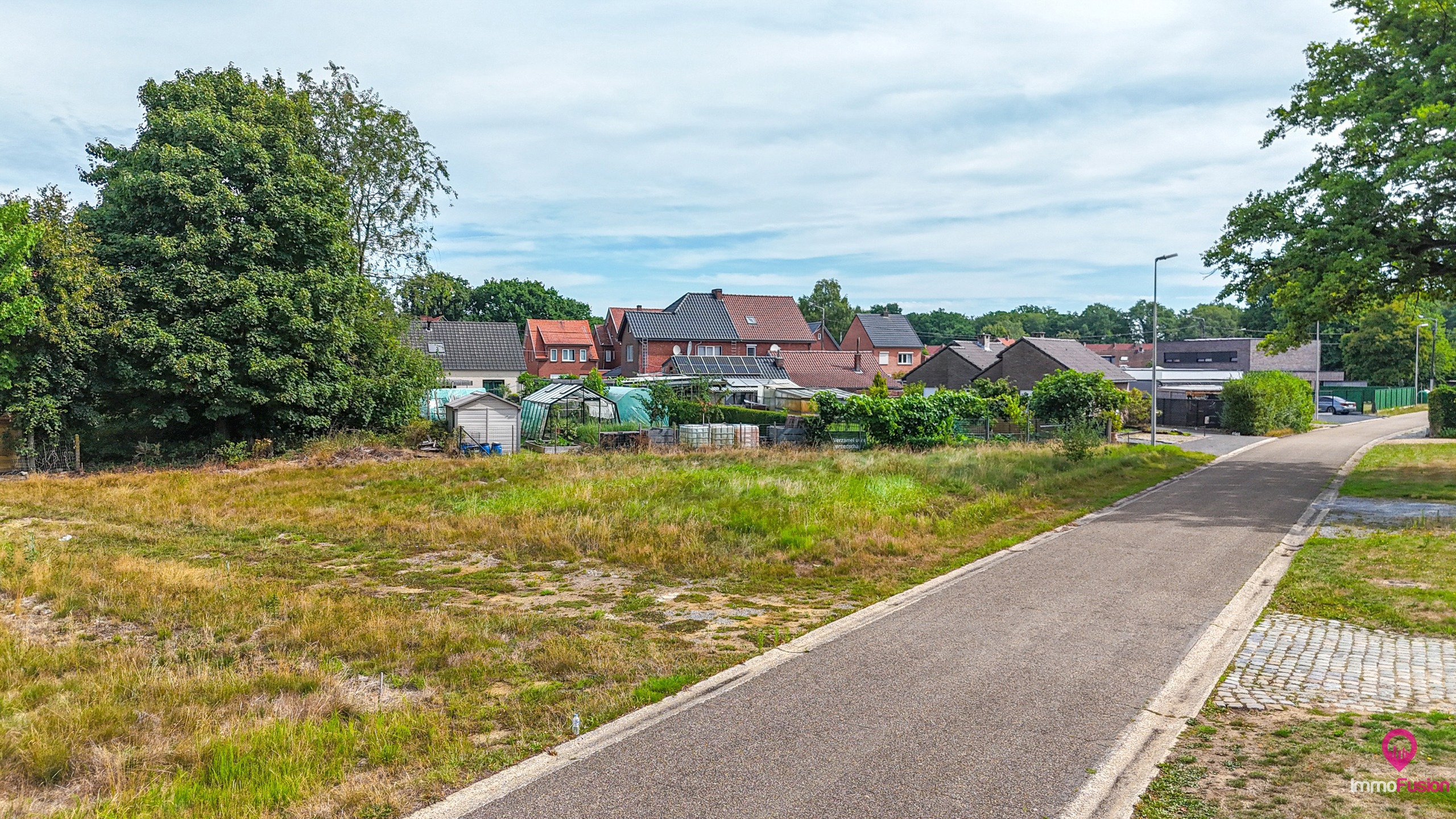 Perceel met uitzonderlijke breedte (40m) in groene omgeving! - foto 4