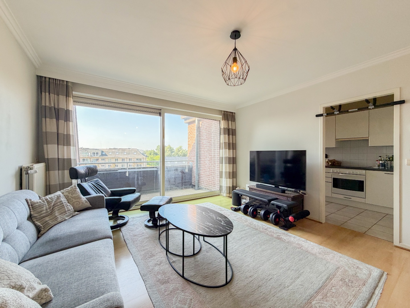 Te koop, Energiezuinig 2-slaapkamerappartement met zonnig terras en garagebox te Melle! - foto 5