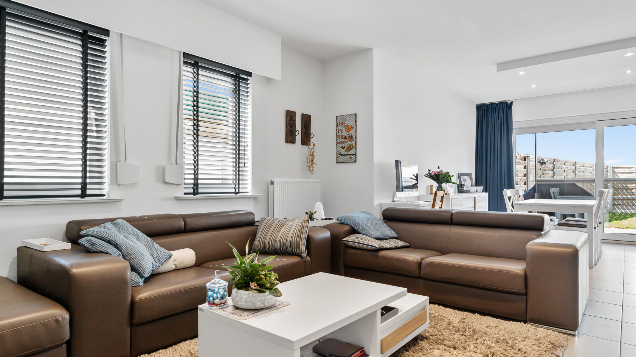 Gelijkvloers appartement met tuin en 2 autostaanplaatsen (1 ondergronds met berging en 1 bovengronds) - foto 3