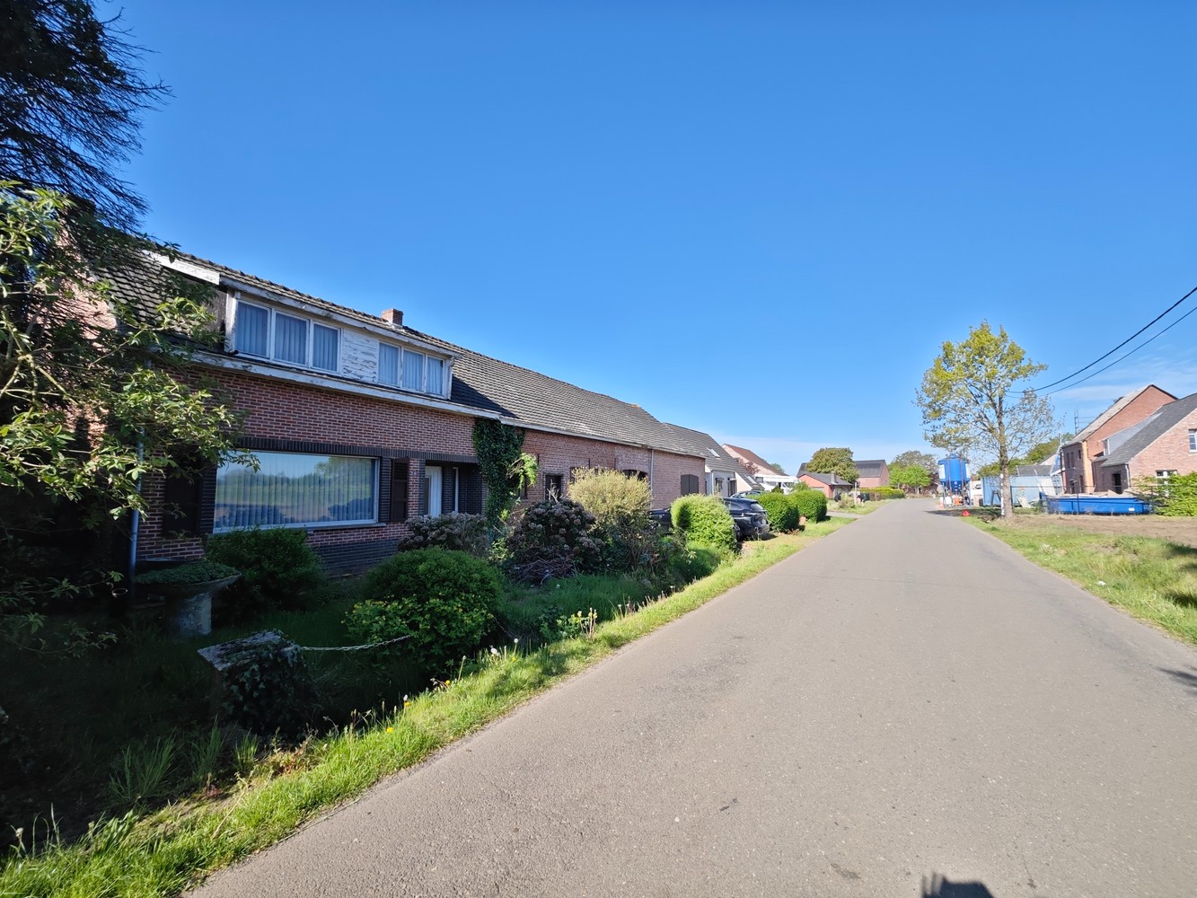 Te renoveren langgevelhoeve + langsliggend perceel bouwgrond voor open bebouwing. - foto 4