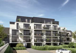 Parc Astrid is een stijlvol en kleinschalig nieuwbouwproject aan de Koningin Astridlaan, pal in het centrum van Wetteren. Dankzij deze centrale ligging bevinden winkels, horeca, scholen en openbaar vervoer zich op wandelafstand, terwijl de groene binnentuin en de nabijheid van de Schelde zorgen voor rust en privacy.

De residentie biedt een gevarieerd aanbod van appartementen met 1, 2 of 3 slaapkamers. Elk appartement is ontworpen met aandacht voor licht, ruimte en wooncomfort. Grote raampartijen creëren een aangename leefomgeving en zorgen voor een sterke connectie met buiten. Alle appartementen beschikken over ruime, zuidwestgerichte terrassen of een privatieve tuin.

Parc Astrid zet volop in op duurzaam en toekomstgericht wonen. De appartementen zijn uitgerust met een geothermische warmtepomp, vloerverwarming en -koeling, zonnepanelen en energiezuinige ventilatie. Hierdoor behaalt het project een E-peil van maximaal E30, wat resulteert in lage energiekosten en een hoog wooncomfort.

Appartement 001 is een comfortabel gelijkvloers appartement met leefruimte en open keuken, 1 slaapkamer, badkamer, berging en directe toegang tot terras en tuin.

Kopers genieten van ruime inspraak in de afwerking, zodat elk appartement perfect kan worden afgestemd op de eigen woonwensen. Parkeerplaatsen, bergingen en een fietsenstalling maken het geheel compleet. Ook interessant als investering, met mogelijkheid tot 6% btw onder voorwaarden.
