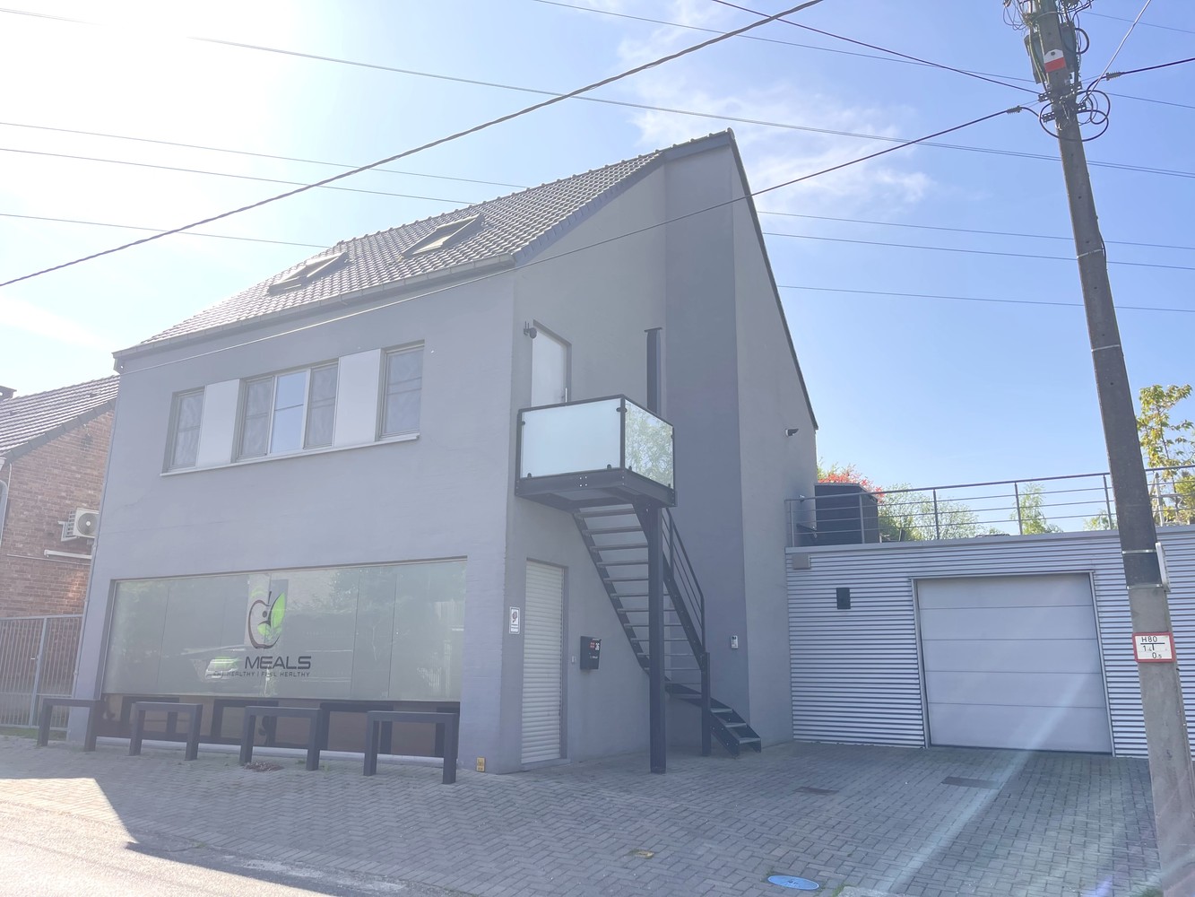 Halfopen bebouwing bestaande uit polyvalent gelijkvloers met woonst - foto 3