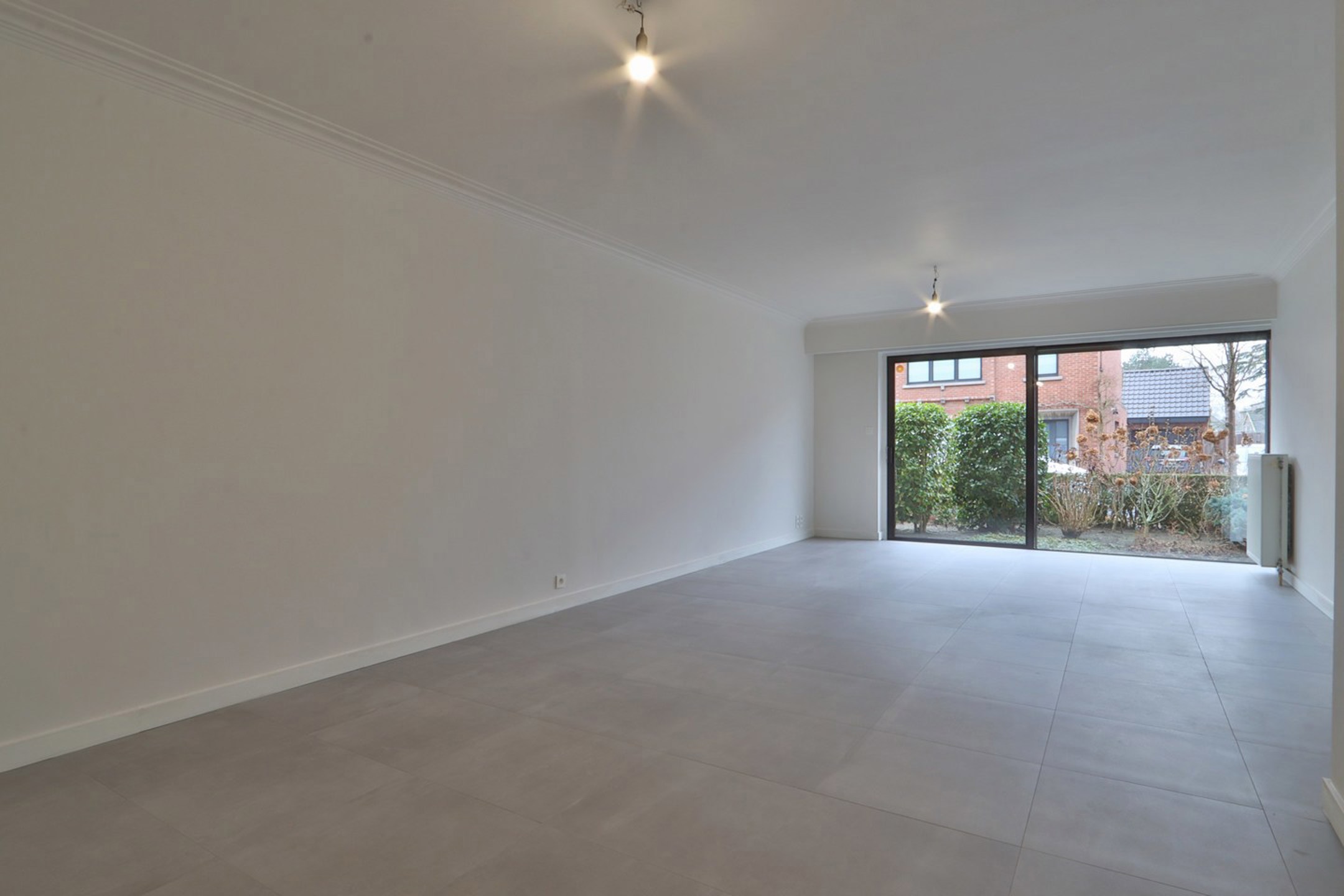 Gelijkvloers 2-slpk app. met garage nabij centrum Beveren - foto 3