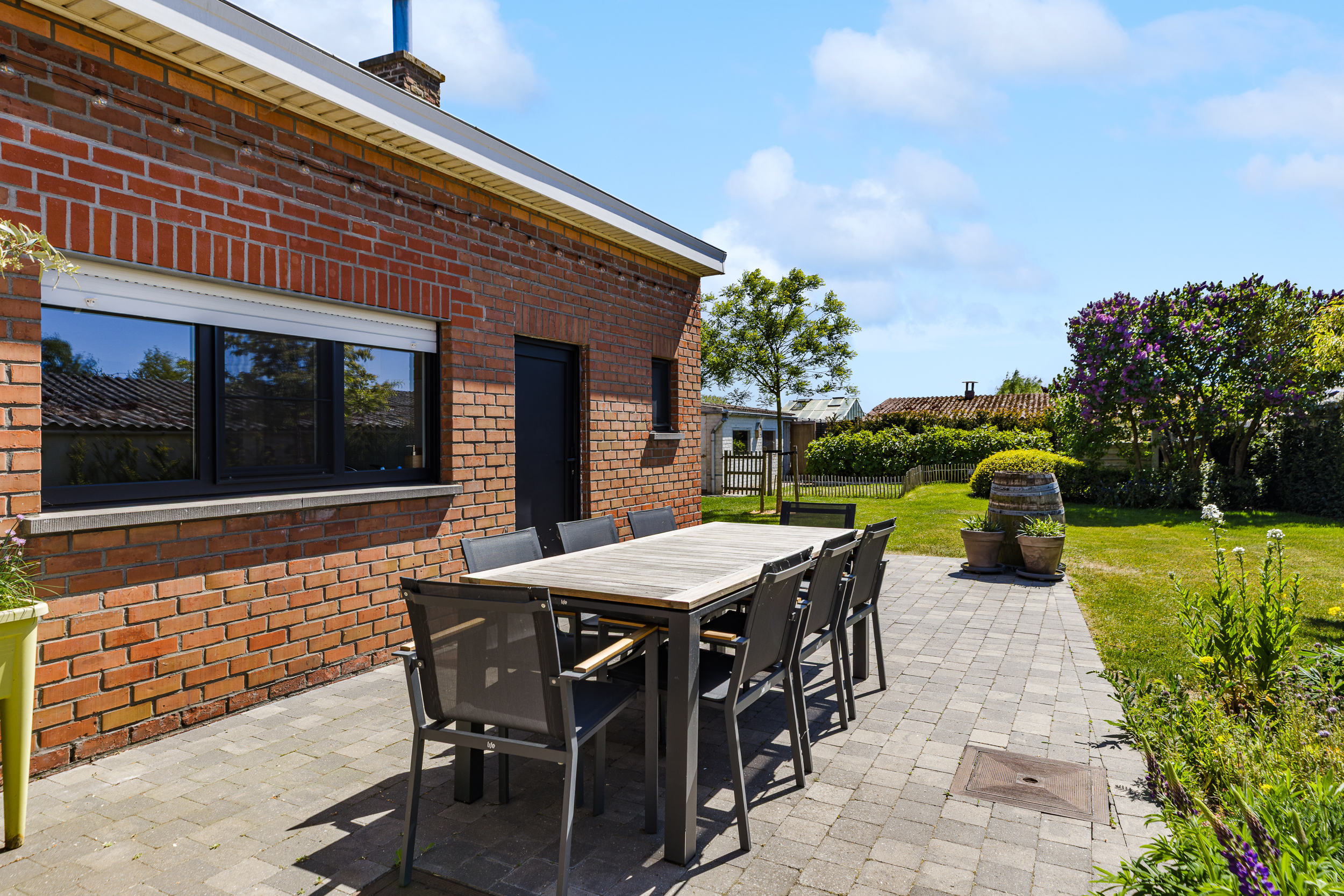 Gelijkvloers wonen met tuin en potentieel - foto 4