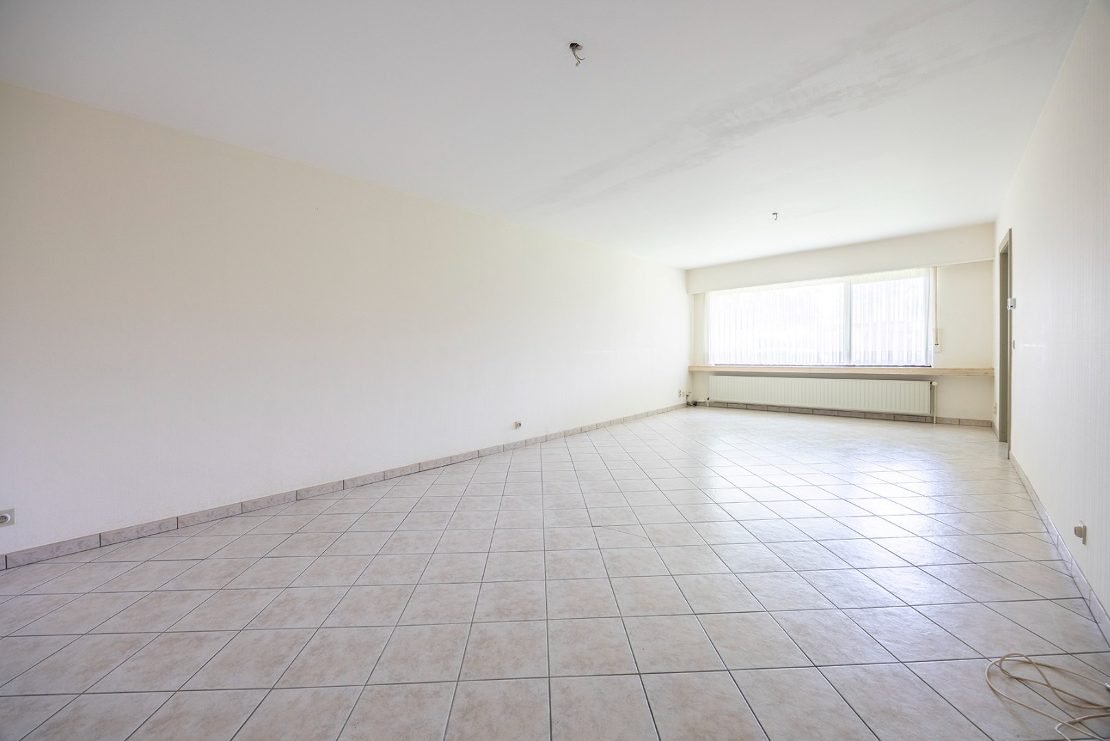 Gelijkvloers appartement met 3 slaapkamers en tuin - foto 3