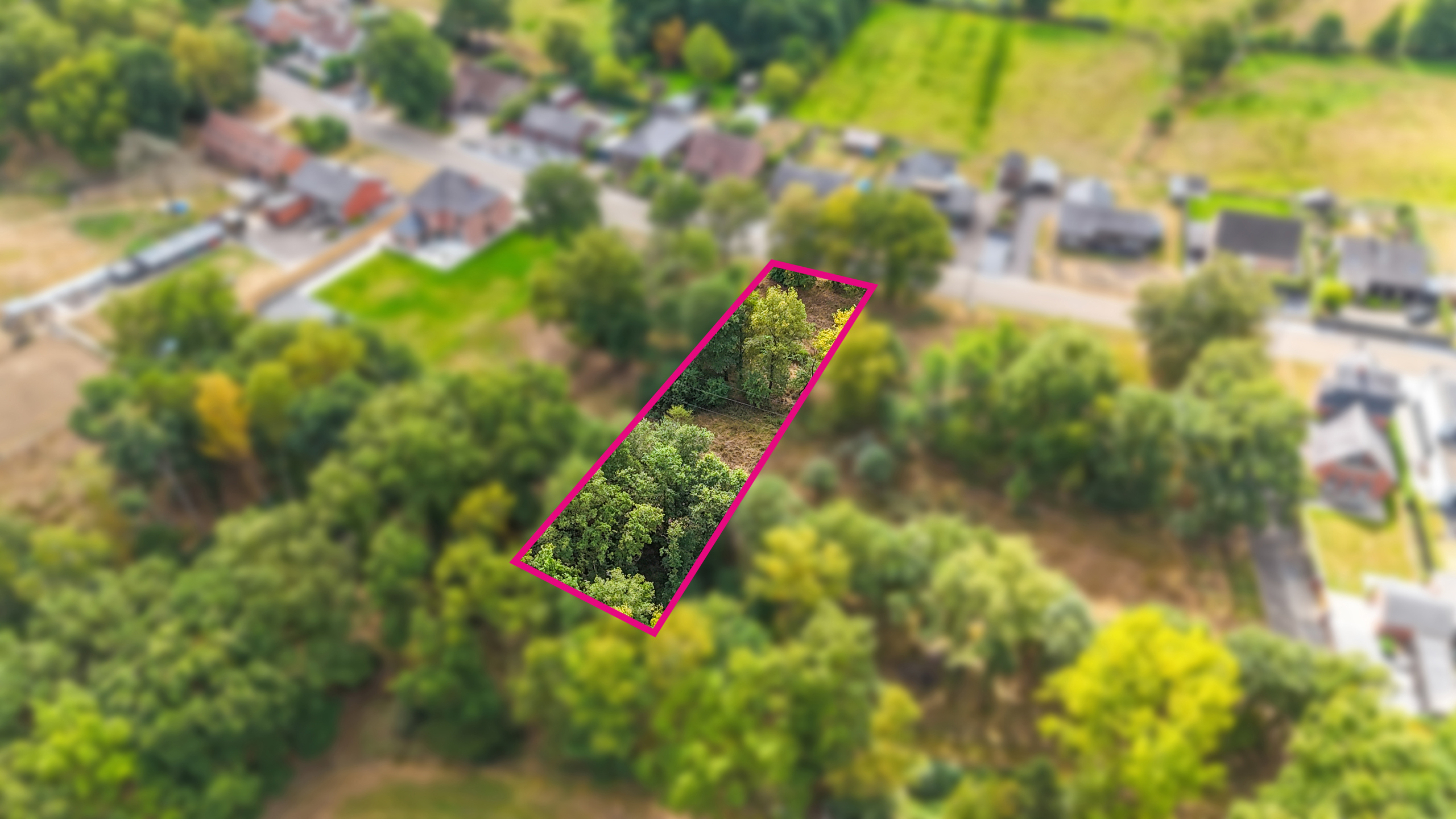 Ruim en groen gelegen bouwperceel (13a) voor open bebouwing! - foto 1