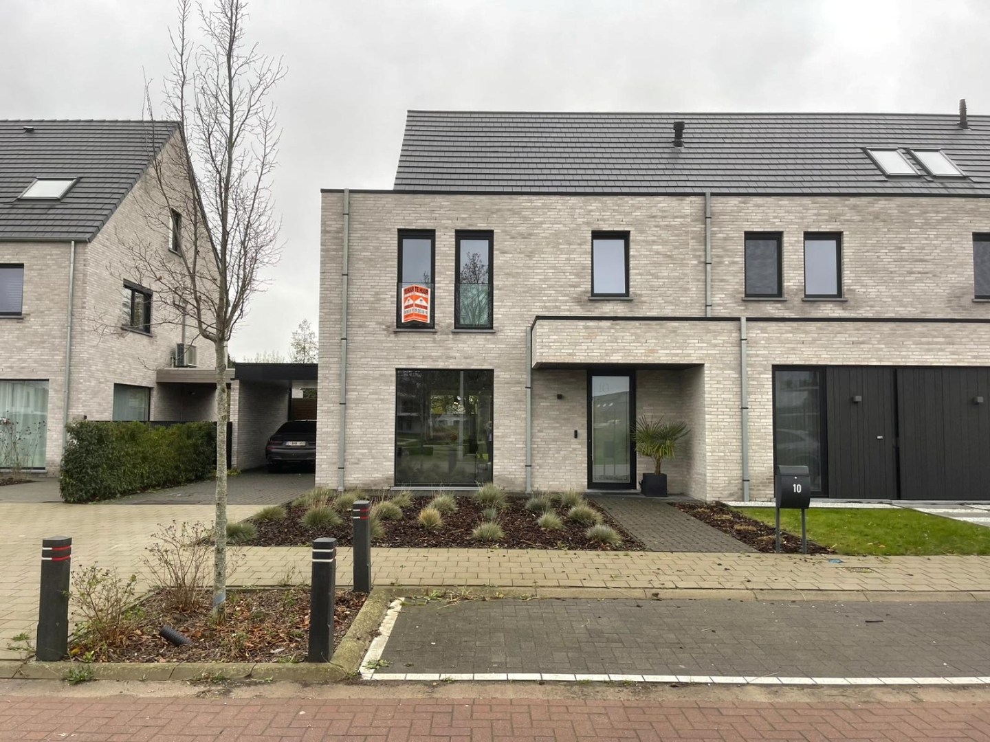 Nieuwbouwwoning in rustige verkaveling te Evergem - foto 1