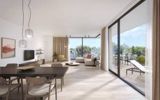 Achat à 6% de TVA possible. Grand appartement ensoleillé près du centre de Coxyde et à qq minutes de la plage.  L'appartement comprend: entrée, buanderie, deux chambres, SDB, wc, cuisine équipée, living avec salle à manger, grande terrasse ensoleillée.  Possibilité d'acquérir un garage dans la résidence (à partir de 55.000 euro). Réf. Ozan 00.02