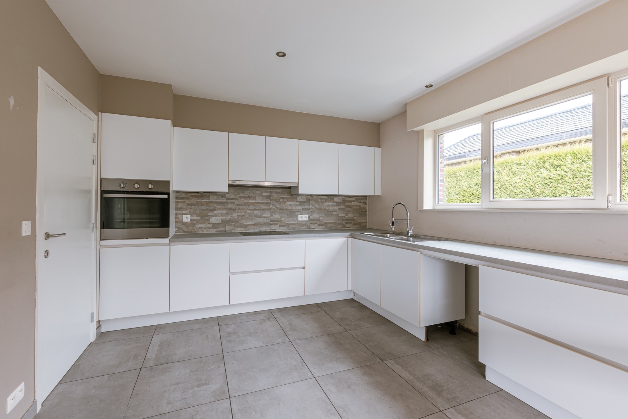 Comfortabele woning met tuin, garage en veel potentieel! - foto 5