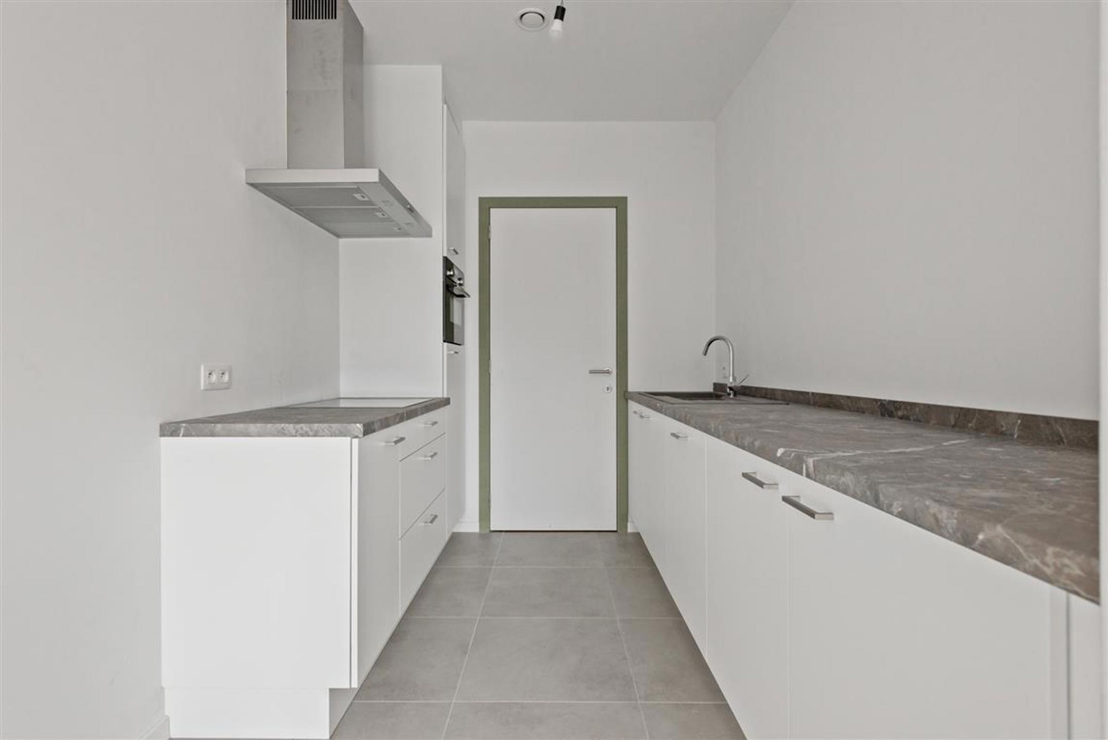 Energiezuinig appartement met 2 slaapkamers, parking + berging  - foto 3