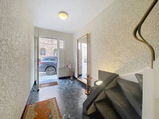 Gelegen op de hoek van de Kerkendijk met de René Carelsstraat. Tegenover het Xaverius College.INDELING EIGENDOMGelijkvloers: 3 aparte garages, elk...