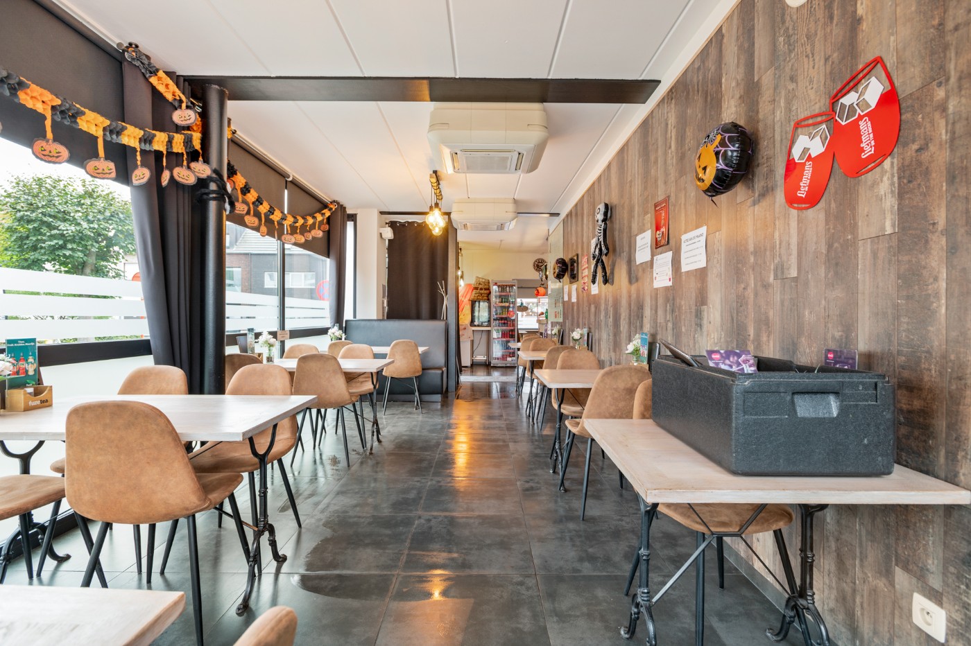 Centraal gelegen opbrengsteigendom met handelsgelijkvloers en app. op de 1e verd. - foto 5