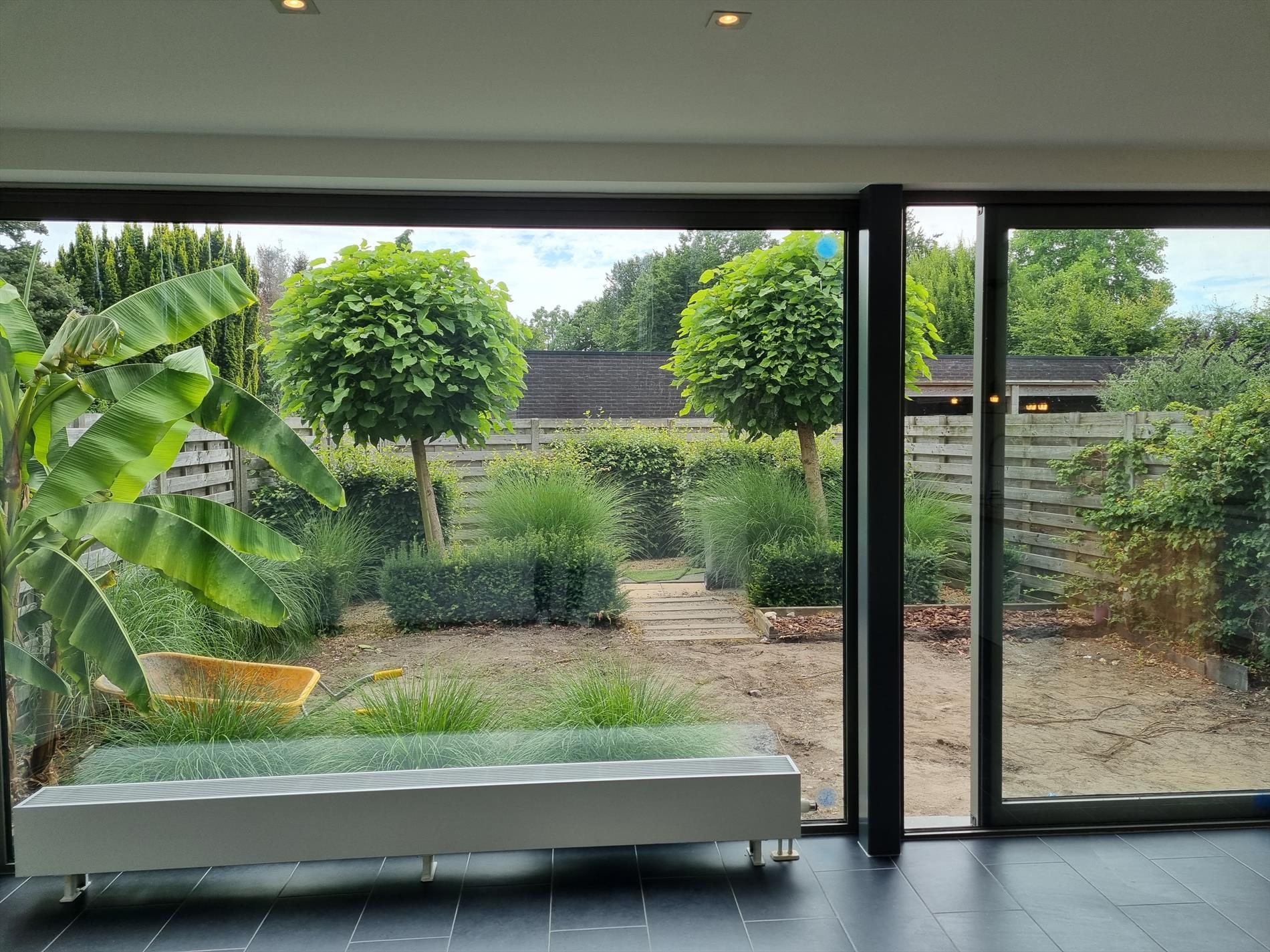Knap gelijkvloers éénslaapkamerappartement met tuin en garagebox. - foto 4