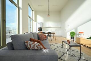 Deze unieke penthouse van 85 m² met verhoogde plafondhoogtes beschikt over een lichtrijke eet- en leefruimte, een open keuken, een technische bergruimte, een afzonderlijk toilet, twee slaapkamers en een badkamer uitgerust met een inloopdouche en dubbele wastafel. Daarnaast heeft het appartement ook een zuidwestelijk georiënteerd terras van 29 m² uitkijkend op de binnentuin.<br /><br />Het appartement is gelegen in Liv de Molens, een stadsinbreidingsproject langs de Leie, in het hart van de stad Deinze. De hoofdarchitect, Reiulf Ramstad, ontwierp met zijn doorwinterde ervaring vanuit zijn Noors architectenbureau een uitzonderlijk project met aandacht op zicht, licht en water een erg divers aanbod aan appartementen.<br /><br />Liv De Molens is een ‘vijf-minutenstad’, waar alles wat u nodig heeft, op slechts vijf minuten afstand ligt. De site van maar liefst 2,2 hectare is een dynamische mix van retail, horeca, diensten, sport, recreatie en wonen, met een groene corridor als verbindende factor. Omringd door een groot park langs de kabbelende Leie, bevinden zich diverse gebouwen met elk hun eigen, unieke karakter, waarbij ieder een appartement geniet van een bevoorrecht zicht op de natuur, de Leie of de stad.<br /><br />Verlaagd BTW-tarief van 6% mogelijk op de volledige constructiewaarde, nu ook voor investeerders mits min. 15 jaar verhuur. Benieuwd? 09 278 78 79 of guillian@landbergh.be