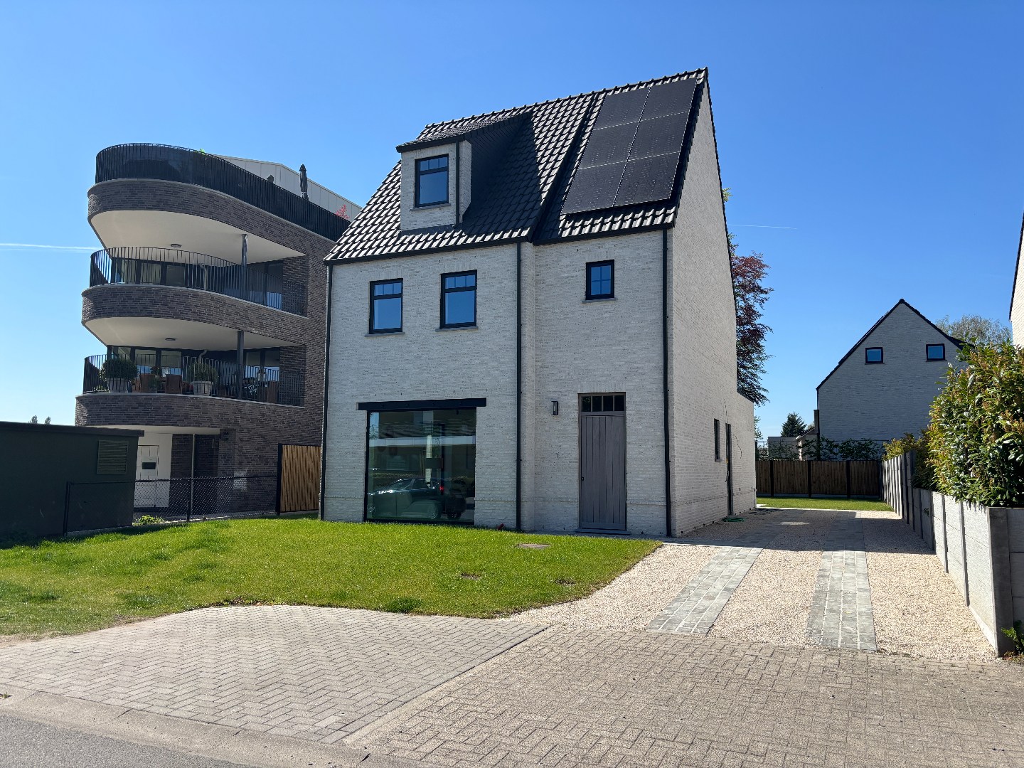 Nieuwbouwwoning met West-tuin in het centrum van Schilde - foto 1