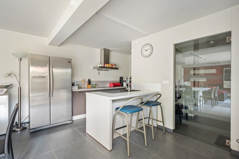 Ruim gelijkvloers appartement (Loft) met 2 slaapkamers en privé-stadstuin in het centrum (aankoop garage én standplaats mogelijk) - foto 2