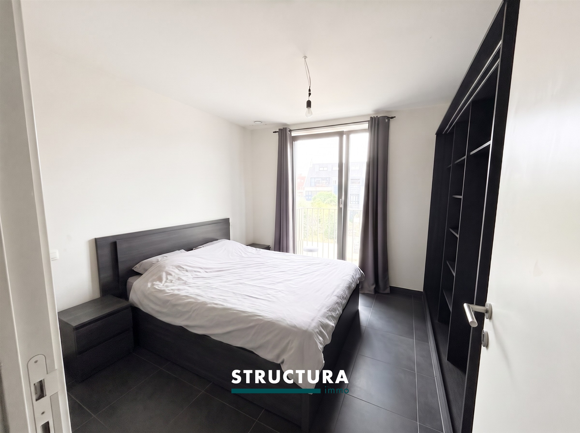 Appartement met ruim terras, staanplaats aan de Markt - foto 4
